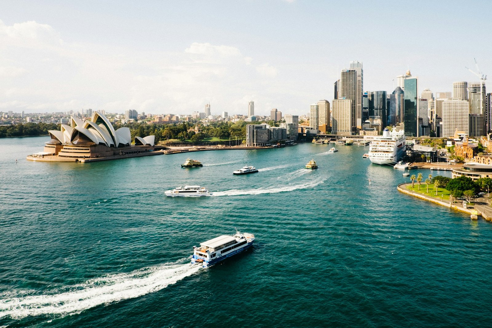 Sydney Opera House with harbour bridge at sunset